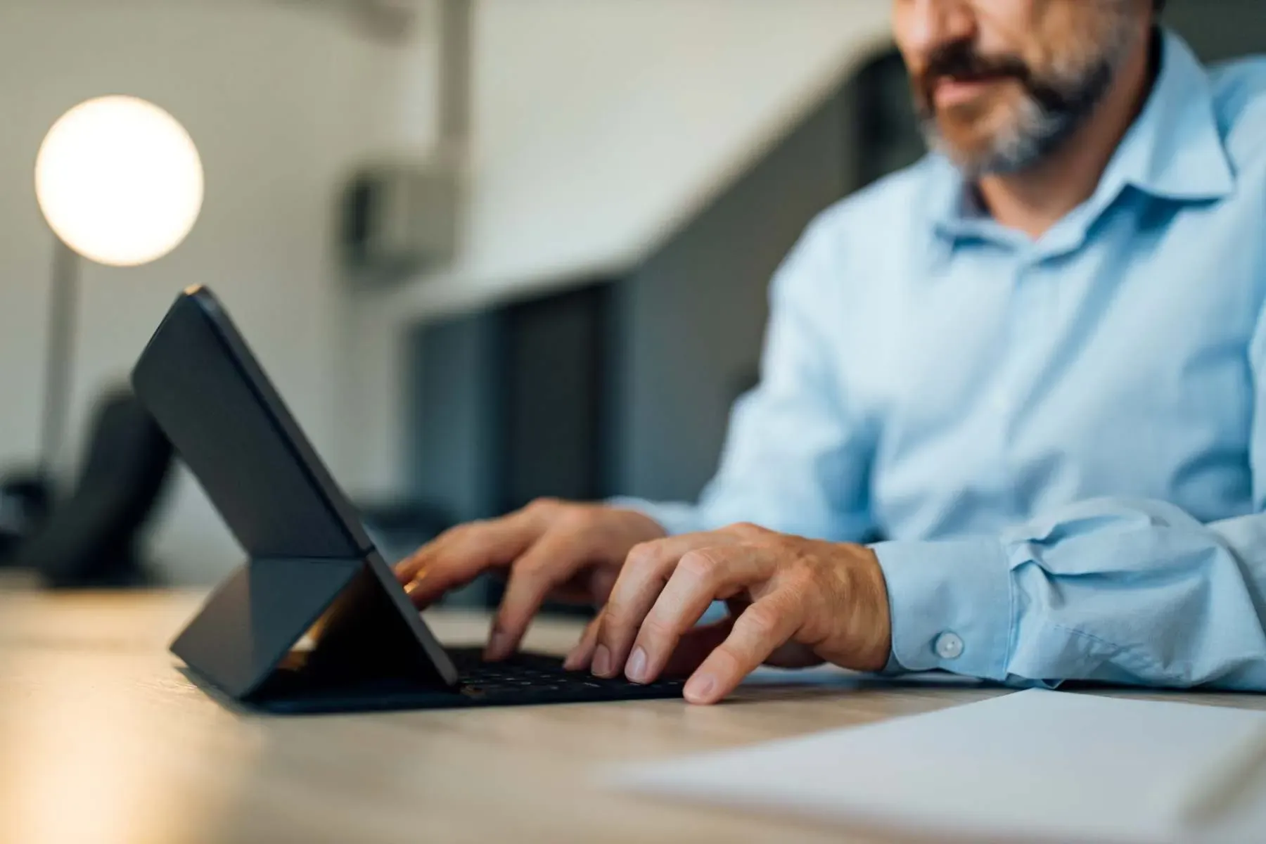 Laptop and paperwork for cloud accounting software McGrath Pattison Accountants Northern Ireland